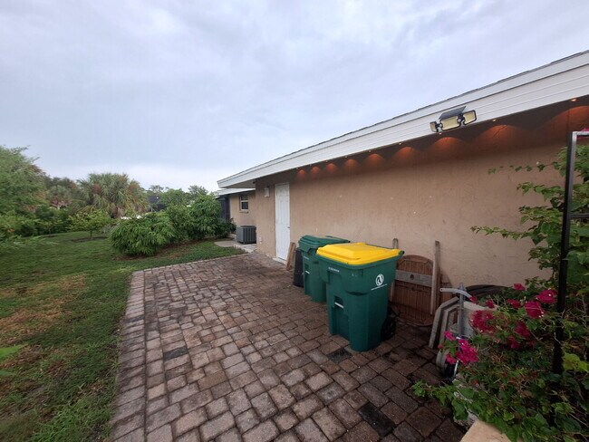 Building Photo - Gulf Access Home on Canal Available Now