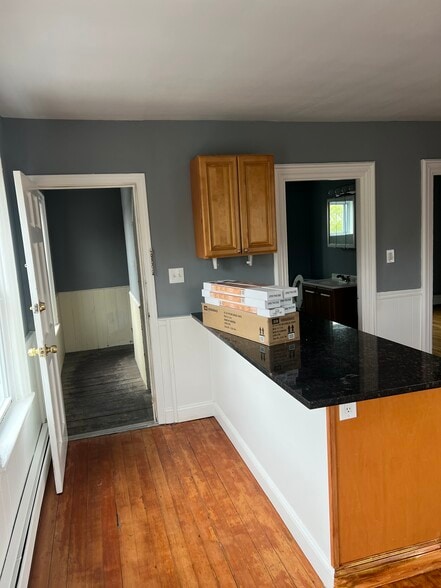 Kitchen and entryway. - 390 East Ave