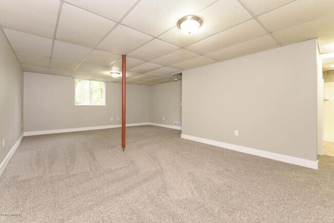Building Photo - Spacious 3BR Duplex with Finished Basement & 2-Car Garage in Otsego