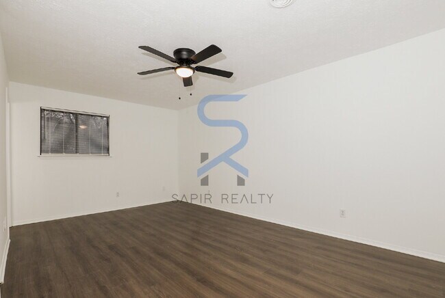 Building Photo - Move in before December 31st and choose your reward: a $250 Amazon Gift Card or a 55" Smart TV!