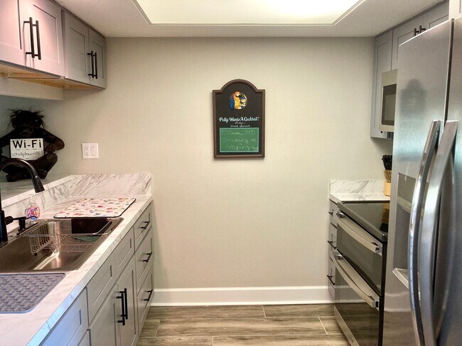 Building Photo - Completely remodeled waterfront condo!