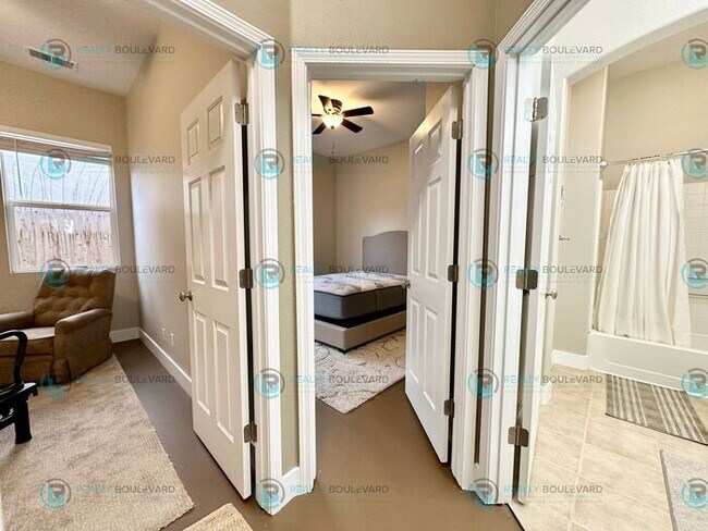 Building Photo - Open Kitchen, Expansive Living, and Covered Patio in Tranquil South Reno Near Trails, Parks & Sho...