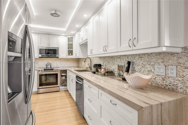 Building Photo - 10185 Collins Ave