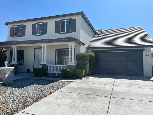 Building Photo - Spacious 5-bedroom, 3-bathroom home in Ade...