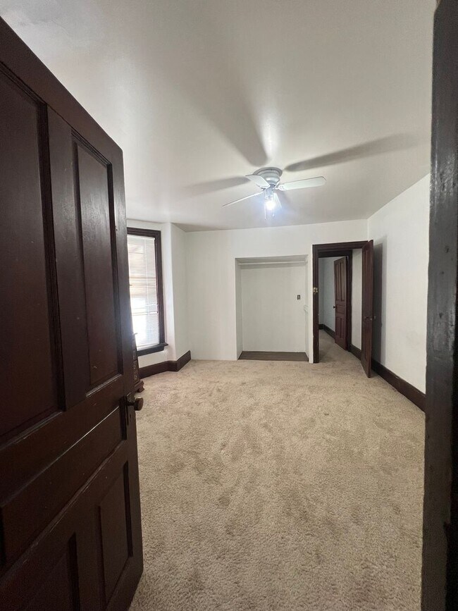 Building Photo - Renovated and Charming Townhome Available Now