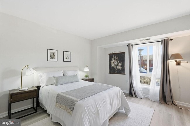 Building Photo - Welcome to this rarely available and beautifully updated ground-level condo offering the perfect ...