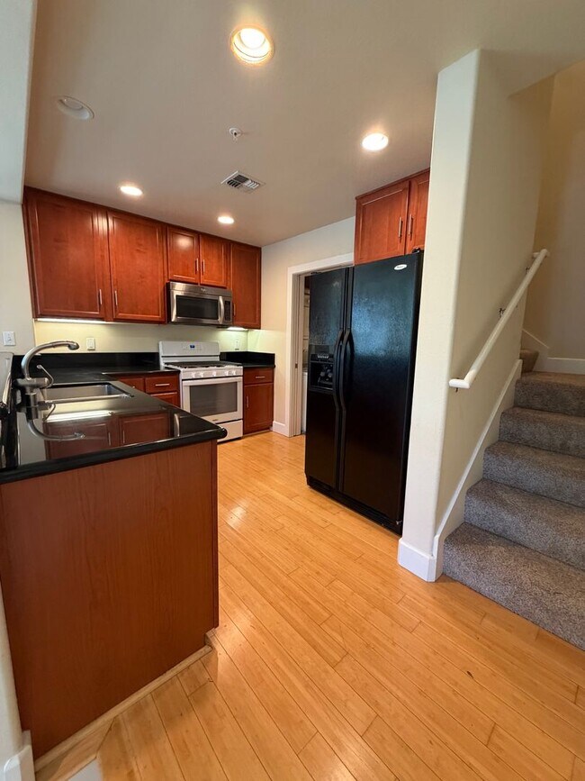Building Photo - 7034-7046 Santero Way Lofts