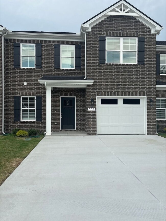 Building Photo - MOVE IN SPECIAL! - BRAND NEW 4 Bedroom Townhome in Shelbyville!
