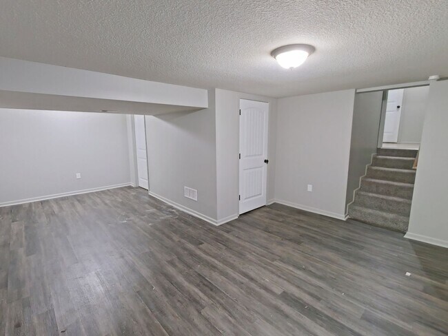 Building Photo - Spacious 3-Bedroom Home with Garage, Finished Basement & Fenced Yard