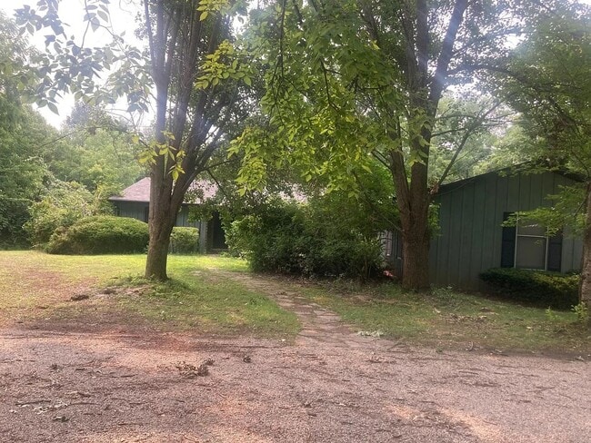 Building Photo - Beautiful Duplex Located in Serene, Wooded...