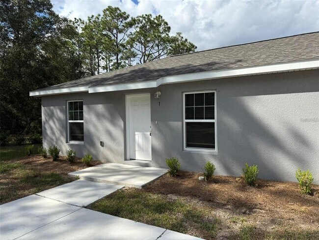 Building Photo - 9541 N Travis Dr