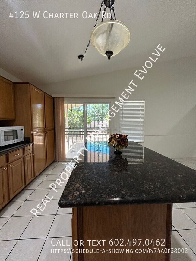 Building Photo - 4125 W Charter Oak Rd