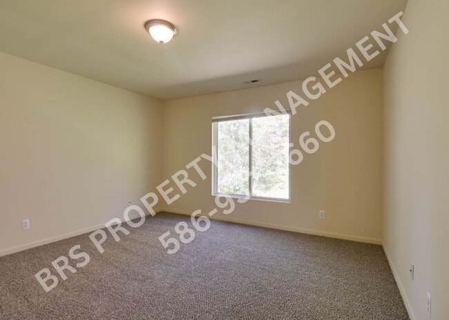 Building Photo - Shelby Twp 2 bedroom, 2 bath condo for lease.