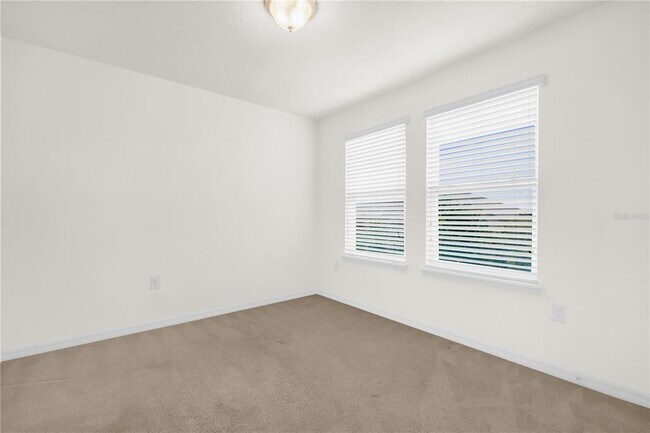 Building Photo - 8130 Red Stopper Ln