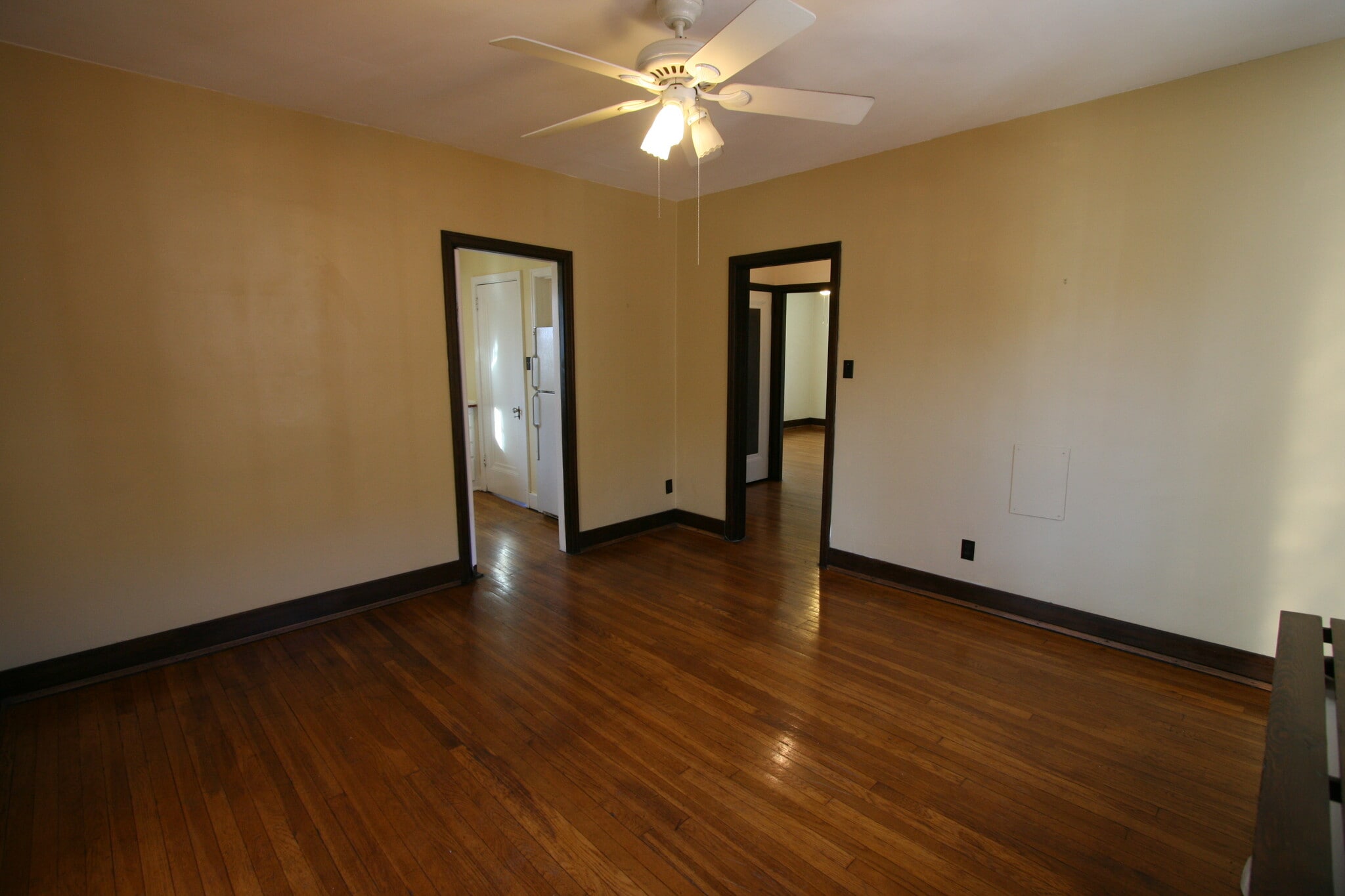 Dining room looking towards kitchen (left) and hallway to bedrooms and bath on right - 330 S Aiken Ave