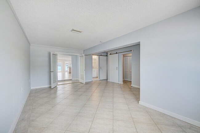 Building Photo - 3/2 Just Steps to the Intercoastal with Boat Ramp and Dock