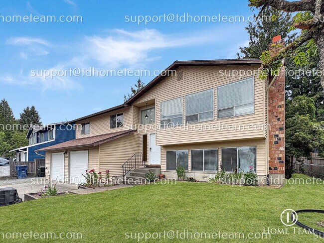 Building Photo - "Spacious 4-Bed Oasis with Granite Touches & Finished Basement in Renton!"