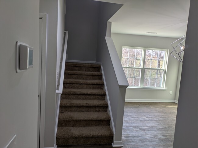 Stairway to the second floor. - 1682 Weatherend Dr