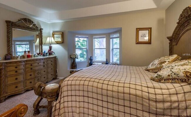 Building Photo - Charming 4-Bedroom Home with Pond Views & ...