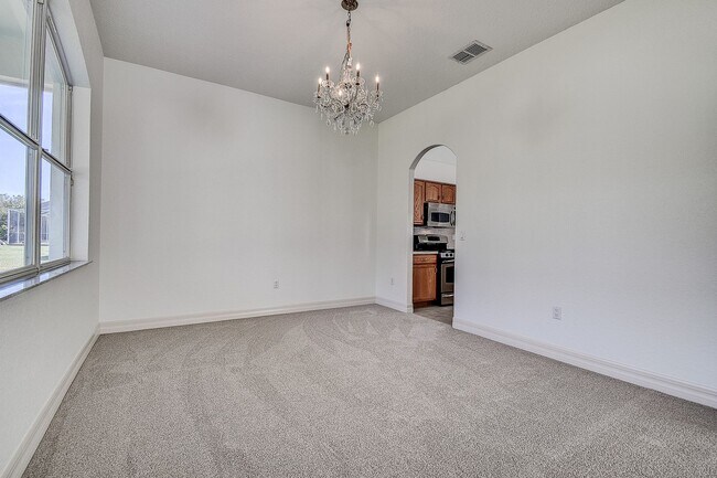 Building Photo - Beautiful 4/3/3 on a private 1 acre lot.