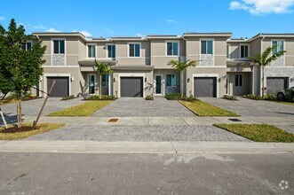 Building Photo - Brand new 3 bed 3.5 bath Townhouse with ya...