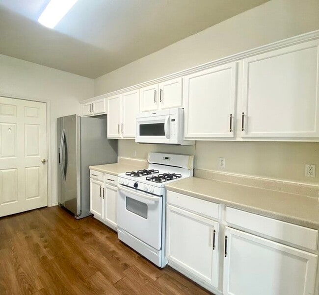 Building Photo - NEW IN MANAGEMENT - AVAILABLE NOW!