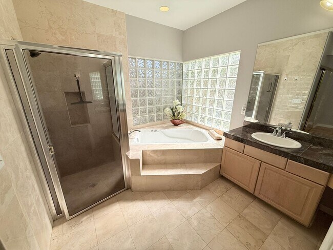 Building Photo - Spacious 4-Bedroom Home with Pool & Spa in...