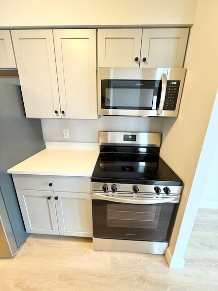 Building Photo - 59-69 Msgr Patrick j Lydon Way Unit 306