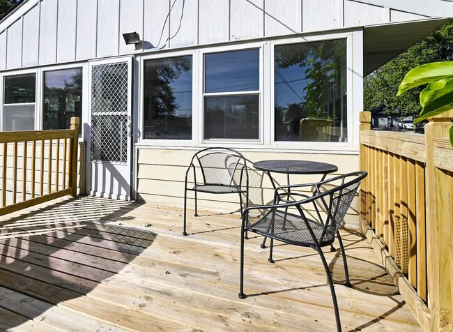 Back Deck off Sunroom with Seating - 8109 Grant St