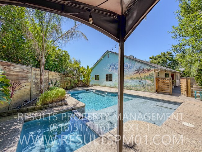 Building Photo - Piece of Paradise Upgraded 3 Bedrm Pool Home