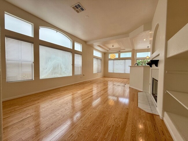 Building Photo - Spacious 3 Bedroom 2.5 Bath Townhouse with Private Garden Patio & a Community Pool/Spa! Attached ...