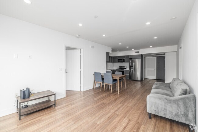 3BR, 2BA - 1,081SF - Living Room - 1450 S Barrington Ave