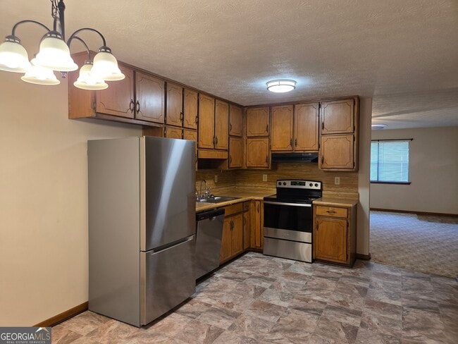 Building Photo - 8457 Pineland Dr