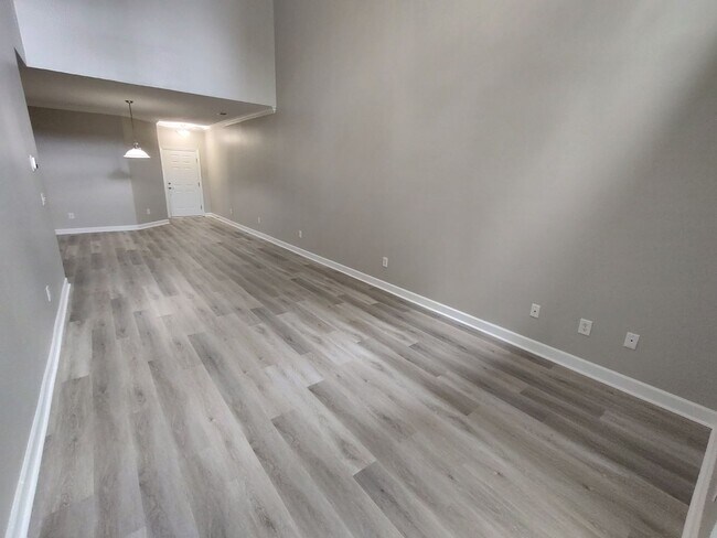 Building Photo - BRAND NEW FLOORING & FRESH PAINT - 3 Bedroom/2.5 Bath Townhome with garage in Wild Wing!