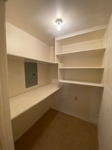 2nd Bedroom Closet with built in shelving - 400 W South Town Dr