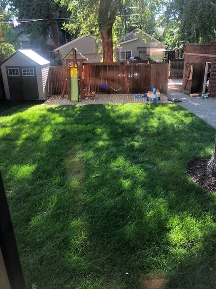 Large fenced in yard! - 1235 S University Blvd