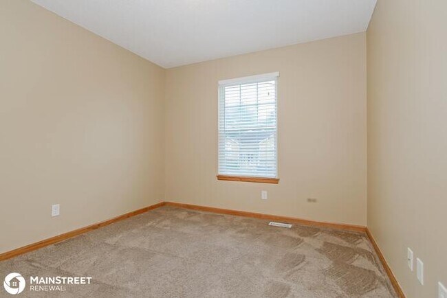 Building Photo - 1608 Tyler Dr, Raymore, MO 64083