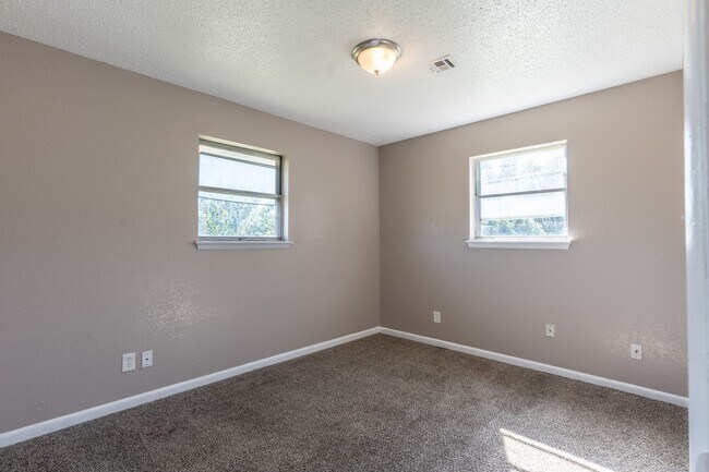 Building Photo - Spacious 4-Bedroom Home with Modern Updates and a Big Yard