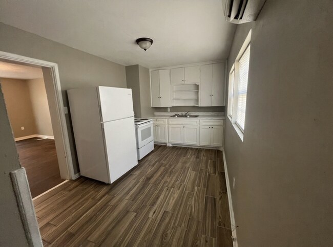 Building Photo - New Management, New Look, New You!