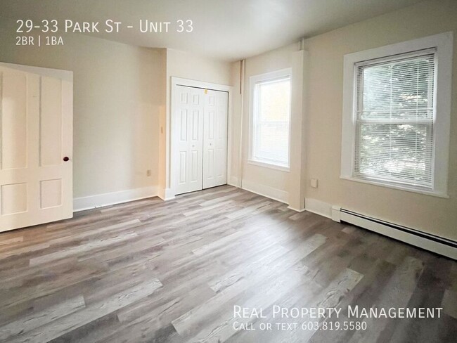 Building Photo - Pet-Friendly, Downtown 2-Bed with Heat and...