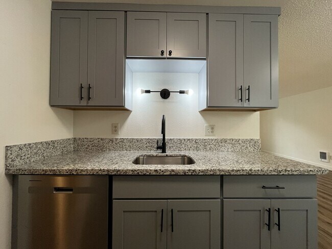 Building Photo - Updated 1BD Apartment Near Downtown with Balcony & Modern Kitchen Updates off street parking
