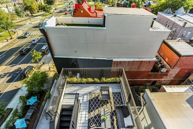 Building Photo - Private Double Decker Rooftop! - Modern Lu...