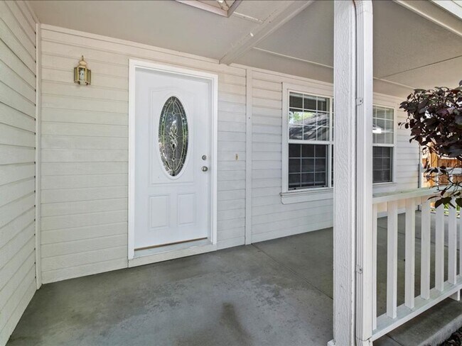 Building Photo - June Rent Free!!  Move Today!  Four Bedroom, Three Bath Home with Beautiful Backyard, Two Car Gar...