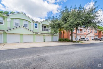 Building Photo - Heron's Landing End Unit Overlooking the S...