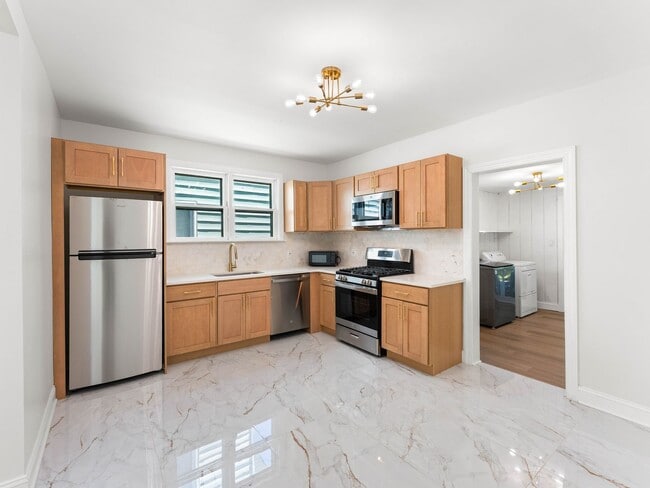Building Photo - Beautifully Renovated 4-Bedroom Home with Designer Kitchen, Updated Bath & Central Air – Availabl...