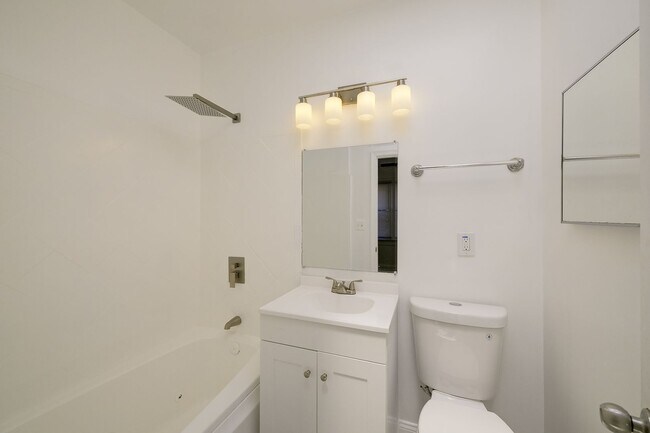 Building Photo - Charming & Renovated Petworth Rowhouse with Parking -  Available Now!