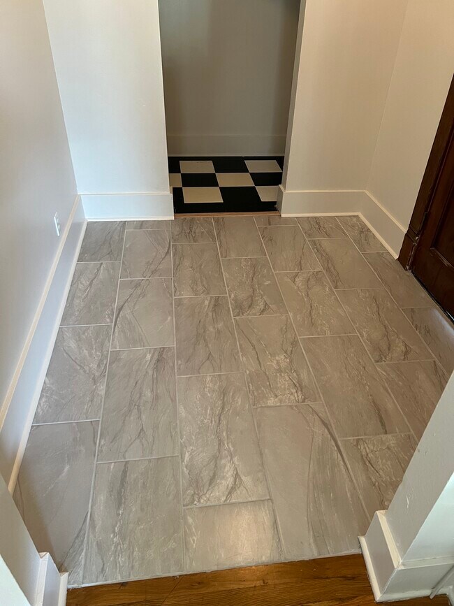 Entry way retiled - 322 E 16th Ave