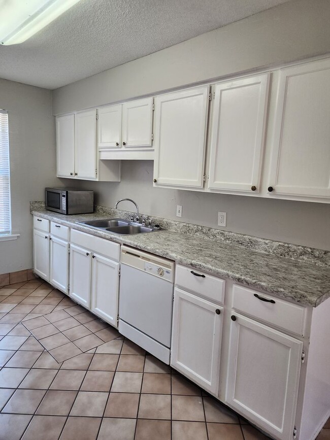 Building Photo - 3 bedroom, 2 bath Norwood home with new HVAC, new roof and fenced in backyard.