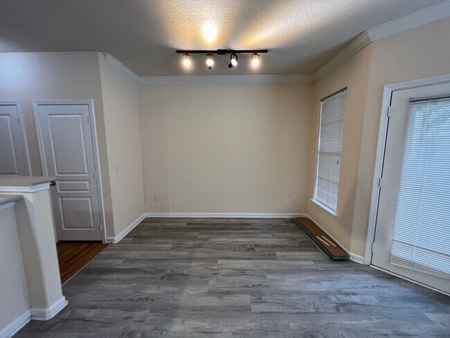 Building Photo - Gardens of Bridgehampton is a luxury condo...