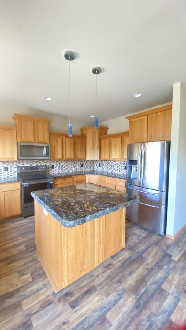 Building Photo - Live Where Convenience Meets Comfort